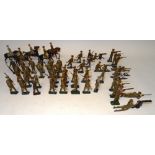 Various hollowcast toy soldiers in khaki, peak caps