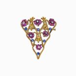 Brooch in yellow gold, diamonds, rubies and sapphires MATERIAL: yellow gold, diamonds, rubies and