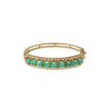 Bangle in yellow gold, diamonds and emeralds MATERIAL: yellow gold, diamonds and emeralds