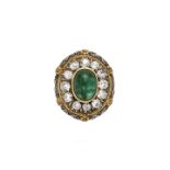 Ring in yellow gold, silver, diamonds and emerald MATERIAL: yellow gold, silver, diamonds and