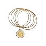 Bangle in yellow gold with coin MATERIAL: yellow gold DESCRIPTION: bangle made of five circles and a