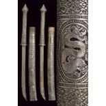 A pair of silver mounted Dha, dating: 19th Century, provenance: Burma, dating: 19th Century,