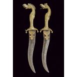 A pair of daggers with brass Yali handles, dating: 18th Century, provenance: South India, dating: