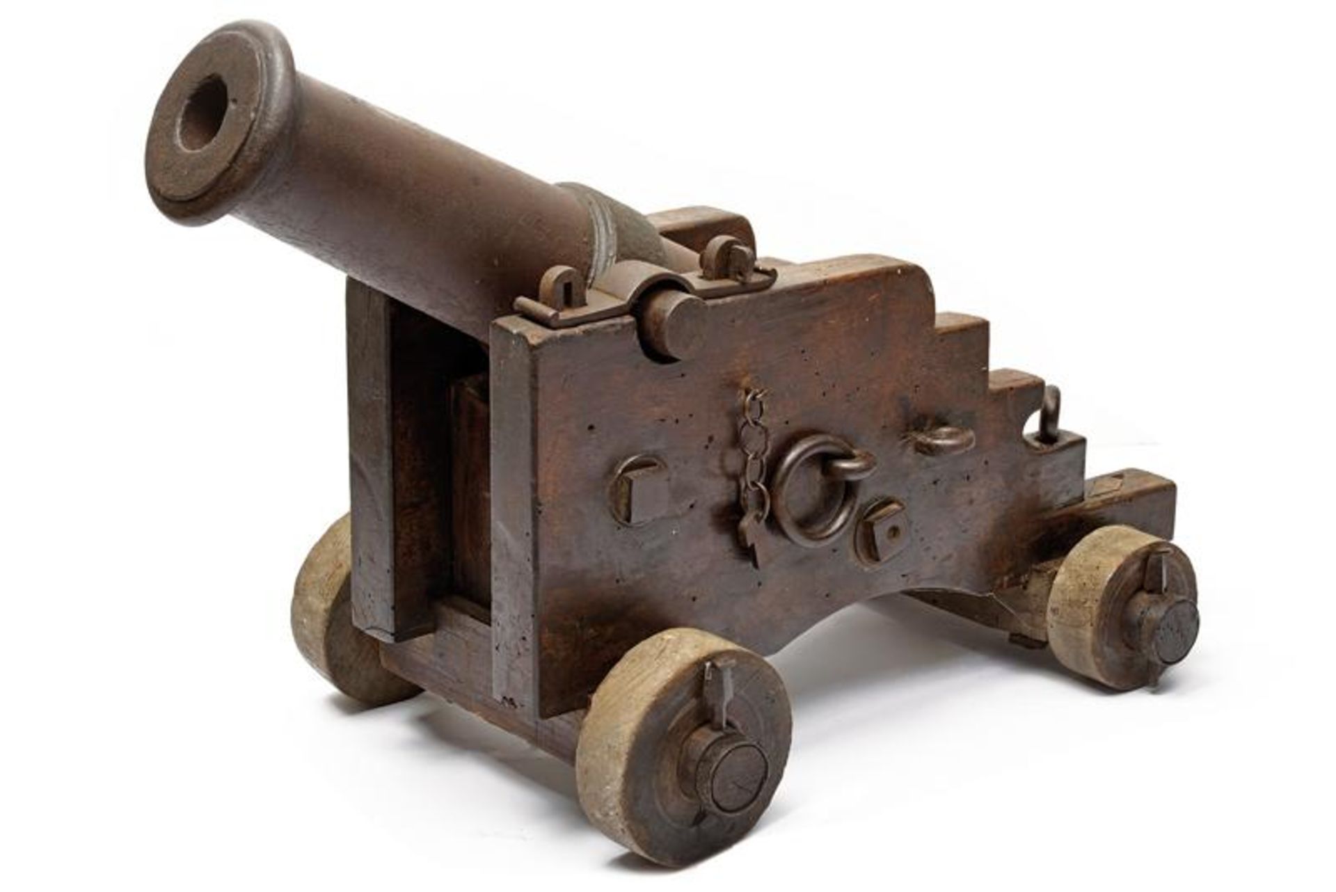 A small iron cannon with carriage