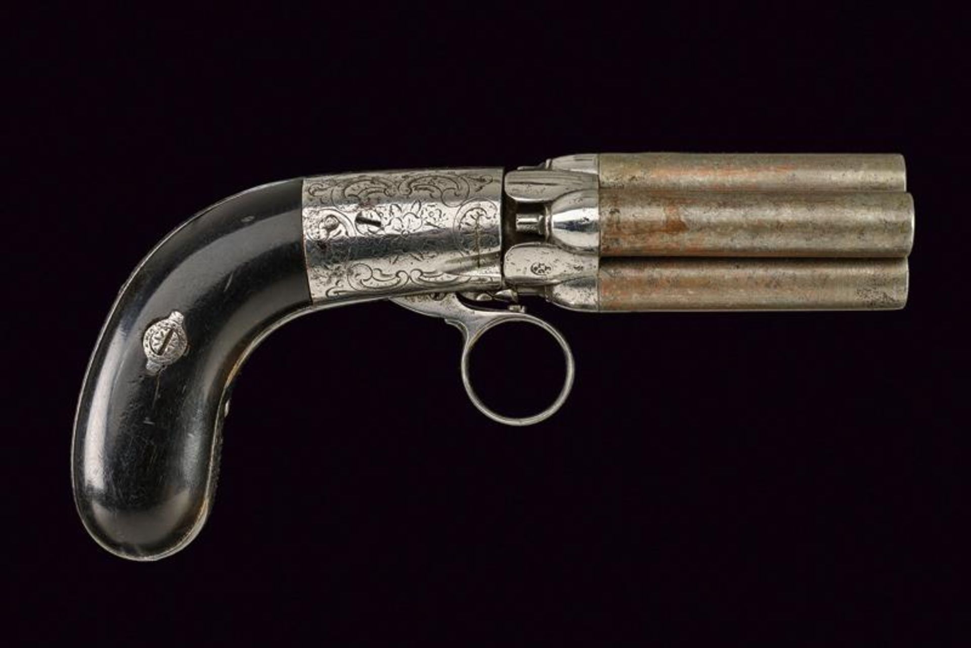 A four barrelled pepperbox percussion revolver by Mariette