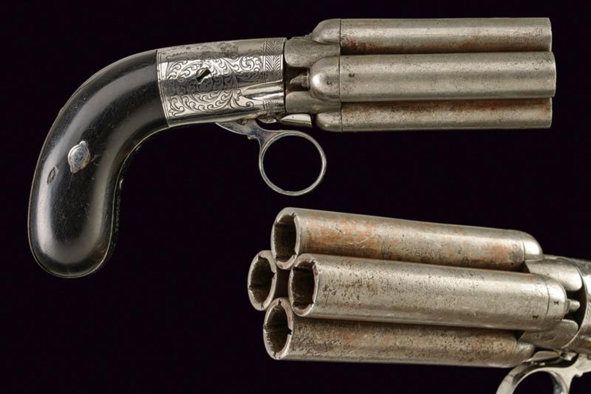 A four barrelled pepperbox percussion revolver by Mariette