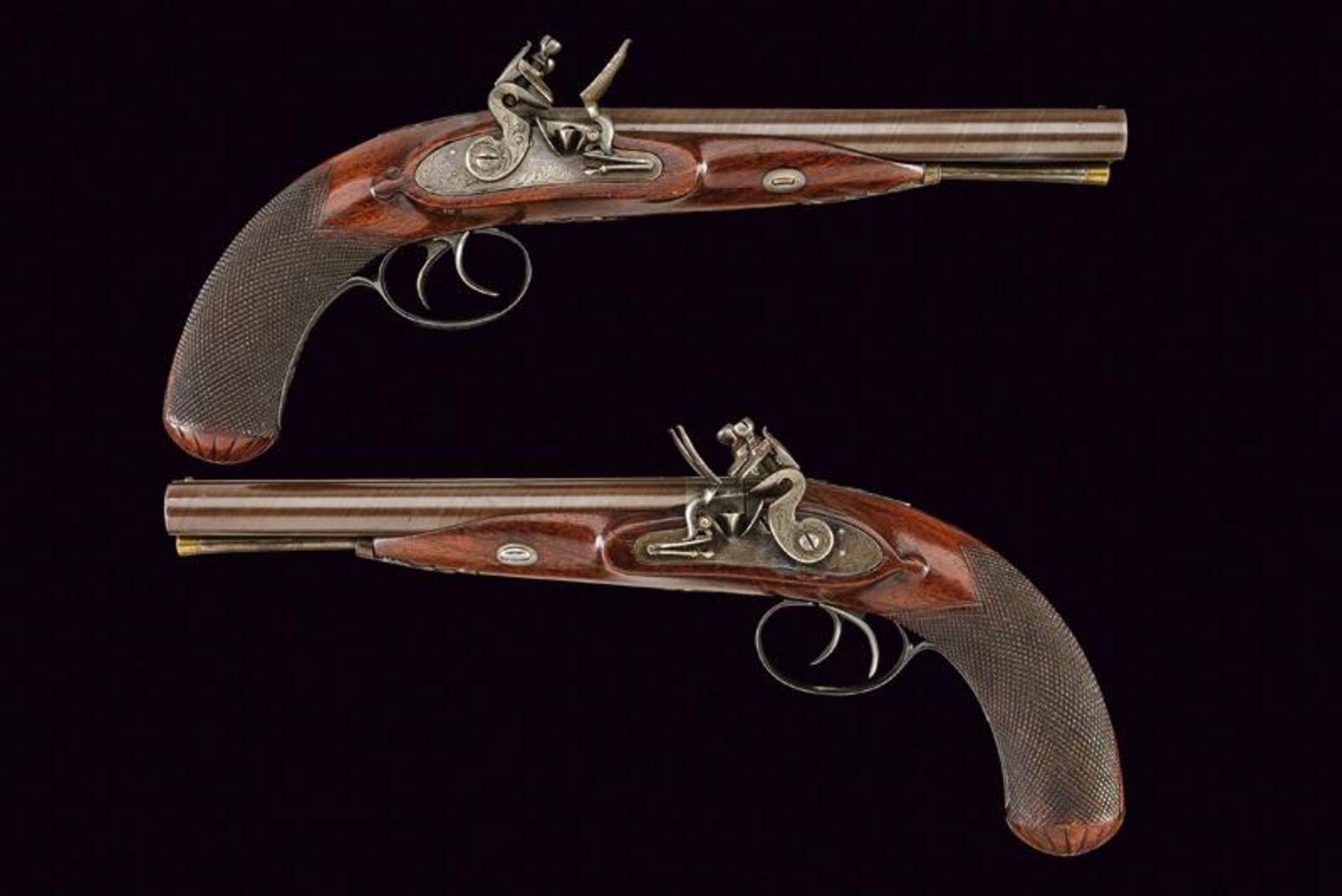 An interesting pair of double barreled flintlock pistols by Nock