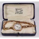 Ladies early 20th century 9ct gold wristwatch hallmarked on expandable bracelet approx 18gm