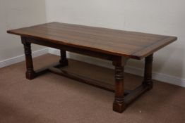 Large oak refectory dining table with planked top on turned supports with stretchers, W228cm D99cm,