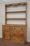 Victorian waxed pine dresser and rack with four drawers and cupboard, W138cm, D48cm,
