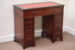 Reproduction mahogany twin pedestal desk, eight drawers, leather inset top, W92cm, H76cm,