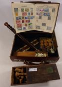 Carved wood chess set, vintage police truncheon, bone and ebony dominoes,