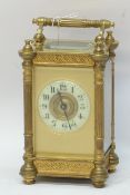 Late 19th century brass Carriage timepiece, blind fret case with columns, W8cm, D6.