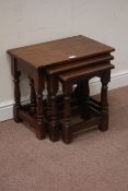 Oak nest of three tables on turned supports, W55cm, D35cm,
