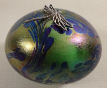 Glasform iridescent paperweight with a silver dragonfly,