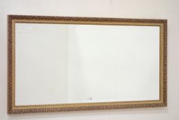 Rectangular gilt framed wall mirror, W133cm,