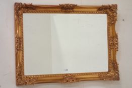 Gilt framed wall mirror with bevelled plate, W109cm, H79cm,