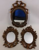 Pair of small Venetian style wall mirrors and another oval mirror Condition Report