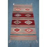 Woven woolen rug 47cm x 75cm Condition Report <a href='//www.davidduggleby.