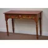 Stained pine writing table, inset top above two drawers, W107cm, D47cm,