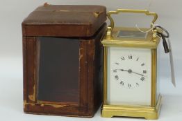 20th century French Brass carriage clock with white dial,
