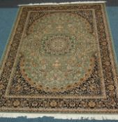 Green ground Keshan pattern carpet, 280 x 200cm Condition Report <a href='//www.