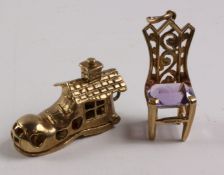 Gold 'Old woman who lived in a shoe charm' and an amethyst set chair charm both hallmarked 9ct