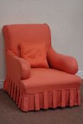 Early 20th century upholstered armchair in loose cover on turned front supports Condition