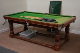 Oak finish half size slate bed snooker table with balls, cues, rest, scoreboard and light, W230cm,