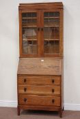 20th century oak bureau bookcase with lead glazed doors, W78cm, D38cm,