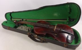 19th Century violin with one piece figured back and carved scroll top,