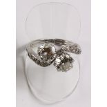 18ct white gold platinum set two stone diamond cross over ring with diamond shoulders approx 2.