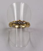 Five stone diamond gold ring in fancy setting stamped 18ct plat approx 3gm Condition