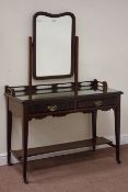 Edwardian mahogany two drawer dressing table on square supports, W107cm, D50cm,