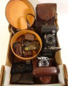 Three vintage cameras, Georgian and later coins,