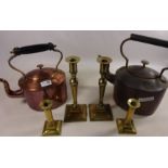 Two copper kettles and two pairs of brass candlesticks Condition Report <a