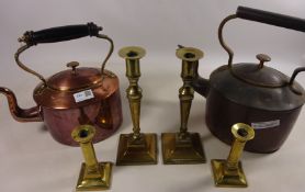 Two copper kettles and two pairs of brass candlesticks Condition Report <a