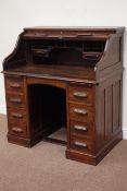 Small early 20th century oak twin pedestal roll top desk, W96cm, D68cm,