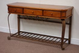 Pine three drawer console table raised on wrought metal base, W133cm, H76cm,