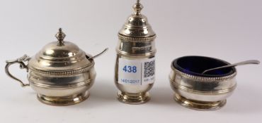 Three piece silver cruet with two spoons by Zaccariah Barraclough Chester 1931 approx 5oz and blue