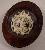 19th Century Amboyna wood framed carved ivory cherub 6.
