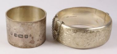 Hallmarked silver hinged bracelet Birmingham 1961 and a napkin ring approx 3.
