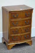 Reproduction yew wood serpentine front chest fitted with four drawers, W51cm, H74cm,