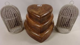 Set of three graduating wooden heart shaped boxes and a pair of wall sconces in the form of bird