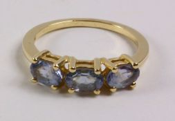 Bi-colour tanzanite three stone hallmarked 9ct gold ring Condition Report <a