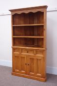 Large pine three tier corner cabinet, fitted with single drawer and double cupboard, W113cm,