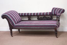 Edwardian carved walnut framed chaise longue, upholstered in striped fabric,