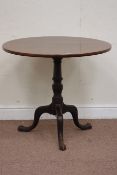 George III mahogany circular tilt top tripod table, turned column, D79cm,