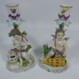 Pair of 19th Century Dresden figural candlesticks,