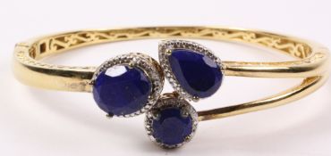 Hinged silver-gilt bangle set with lapis lazuli and diamonds hallmarked Condition Report